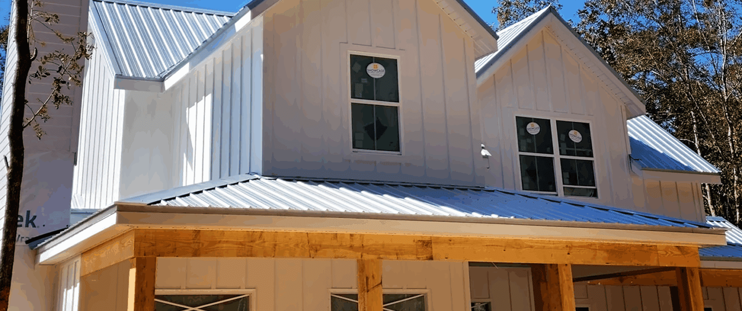New Build Showcasing Metal Roof and Vertical Siding