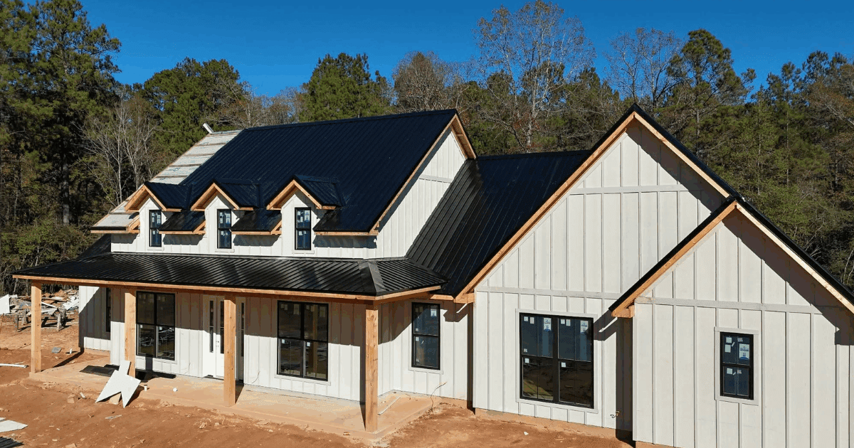 Elegant Elevated Home Construction Nearing Completion with Fireplace Finishing Touches